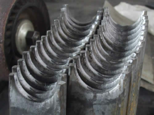 Servicio de punzonado de planchuela, puntas forjadas, aros y retorcidos